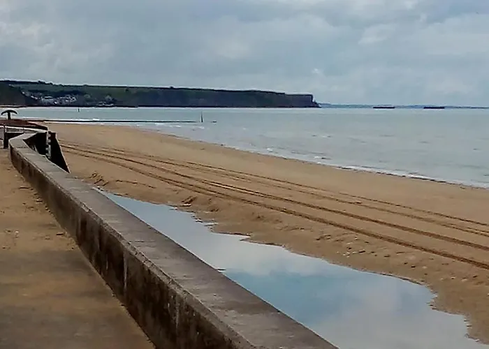 بيت للعطل Chant Des Mouettes Maison Renovee Spacieuse Confort Grand Jardin Belle Terrasse Amenagee Parking 8 Personnes 4 Sdb 5 Wc A 10 Mn A Pied De La En Bessin Tous Commerces Restaurants Proche Omaha بورت-أون-بيسين-هوباين